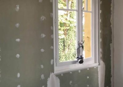 Peinture et mise en place de plâtre pour isolation
