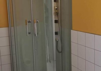 Mise en place de douche dans salle de bain